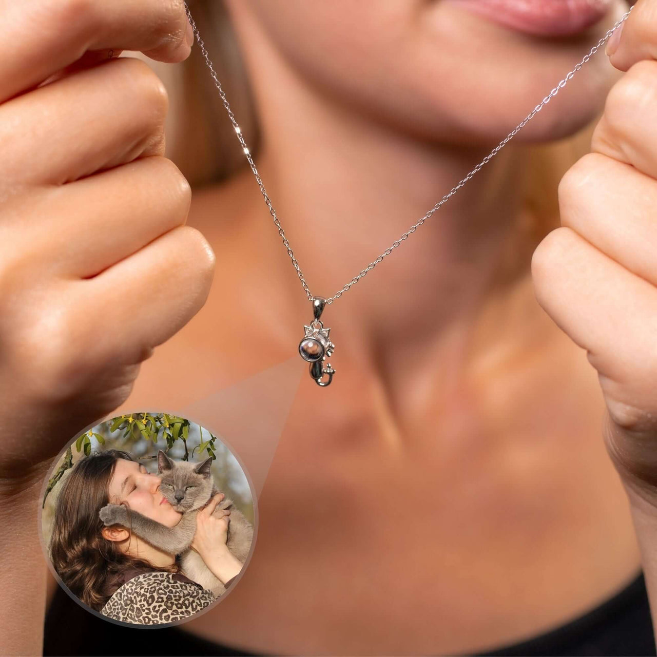 Woman holding an Animal Photo Necklace featuring her cat's image, a personalized gift by Brother & Sisters.