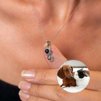 Thumbnail for Woman wearing an Animal Photo Necklace by Brother & Sisters, showcasing a pet photo charm with a dog and cat.