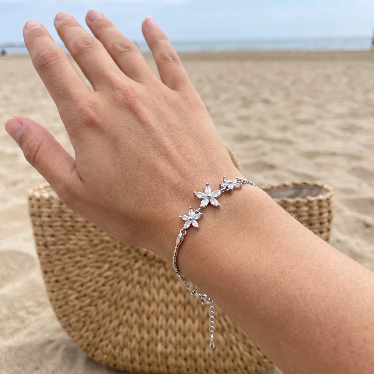 Austrian Crystals Flowers bracelet in silver worn, showing its real size | SKU: 422177-white-gold-XS-S