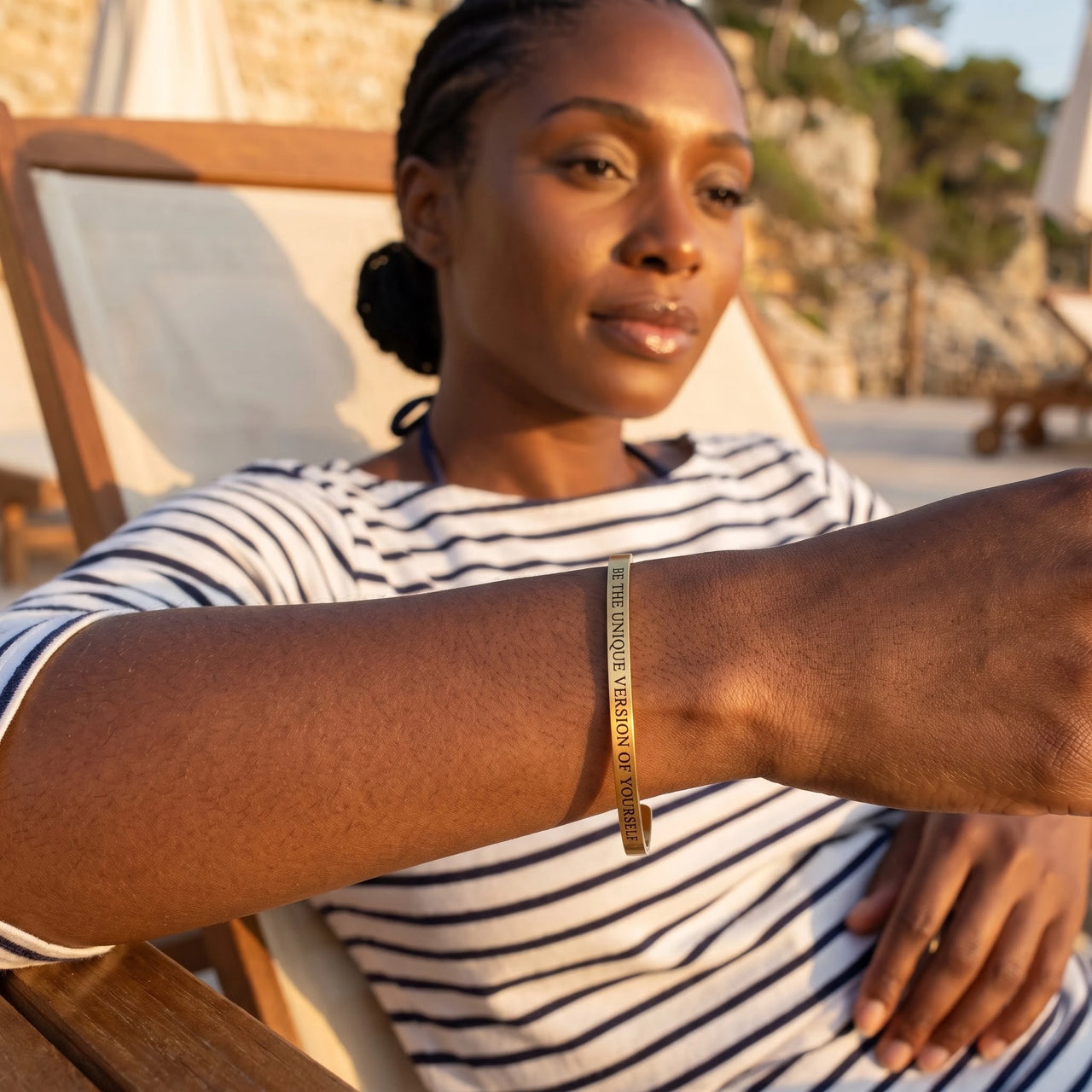 Be The Unique Version Of Yourself bracelet in gold worn during a relaxed moment | SKU: btuvoy-g