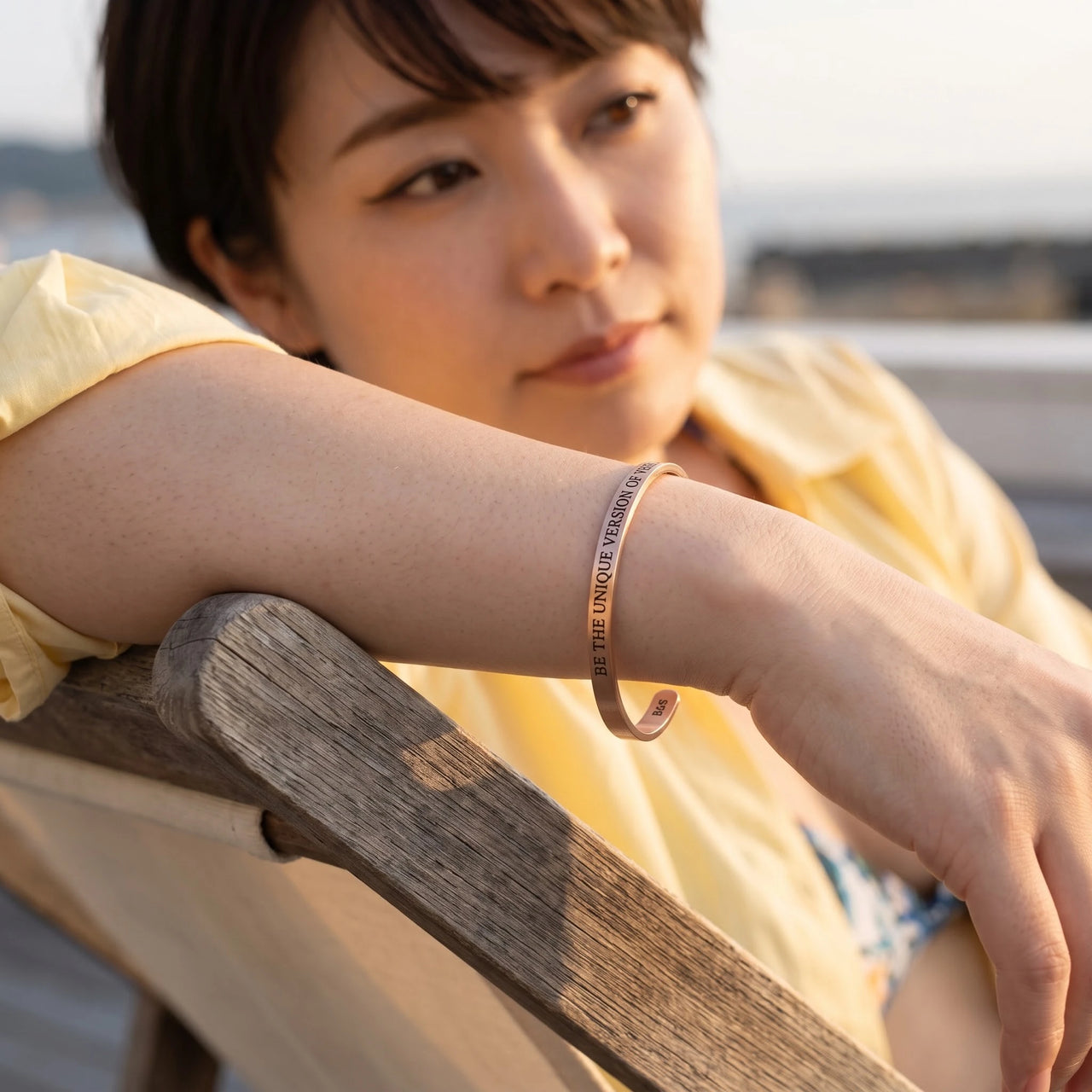 Be The Unique Version Of Yourself bracelet in rose gold worn during a relaxed moment | SKU: btuvoy-rg