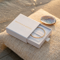 Thumbnail for Singapore Twist Anklet in Brother & Sisters gift box on beach