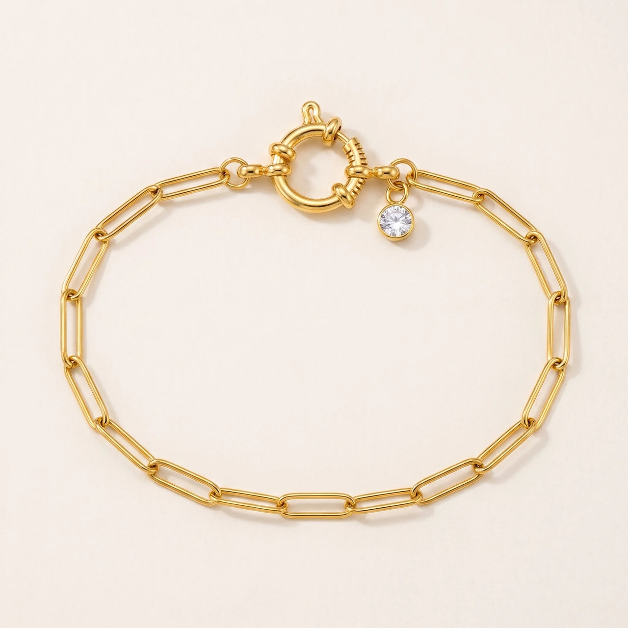 Brother and Sisters Carabiner Anklet packshot — gold paperclip chain with nautical spring-ring clasp and round CZ accent