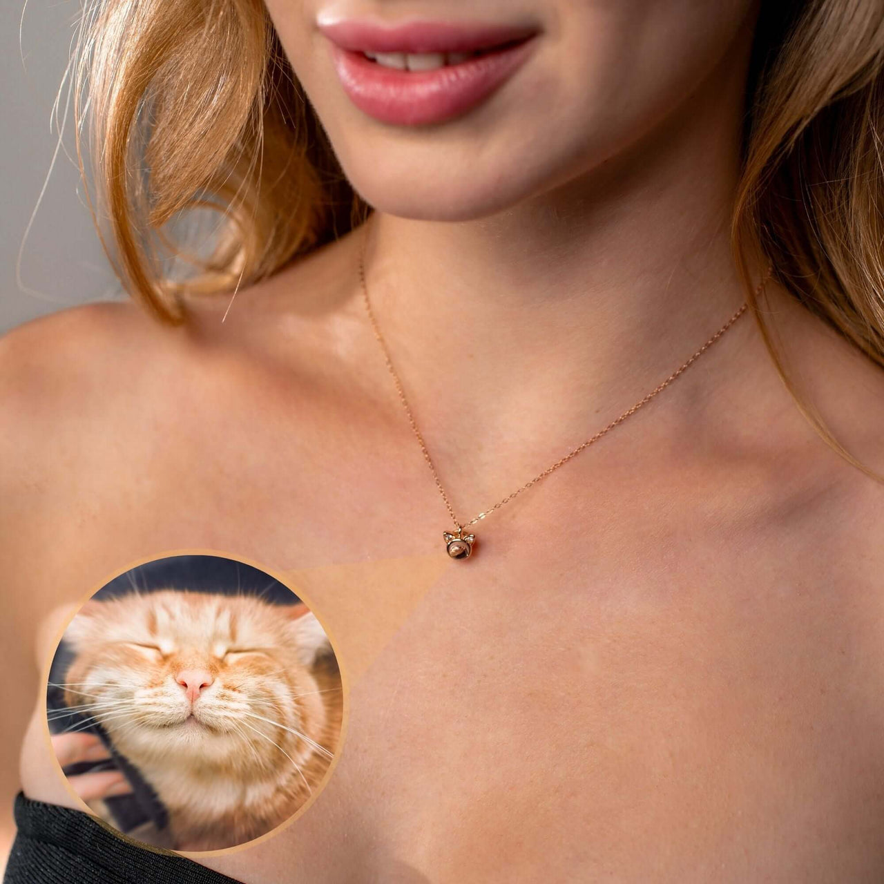 Cat Photo Necklace showcasing a woman wearing it with an image of a smiling cat, by Brother & Sisters.