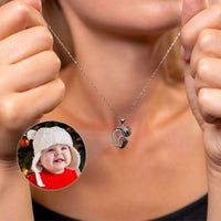 Thumbnail for Child Photo Necklace showing a joyful child’s photo, designed by Brother & Sisters, perfect for preserving memories.