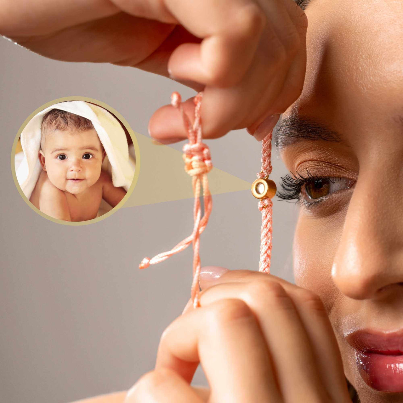 Pink Photo Bracelet showcasing a personalized photo pendant held by a woman, celebrating cherished memories.