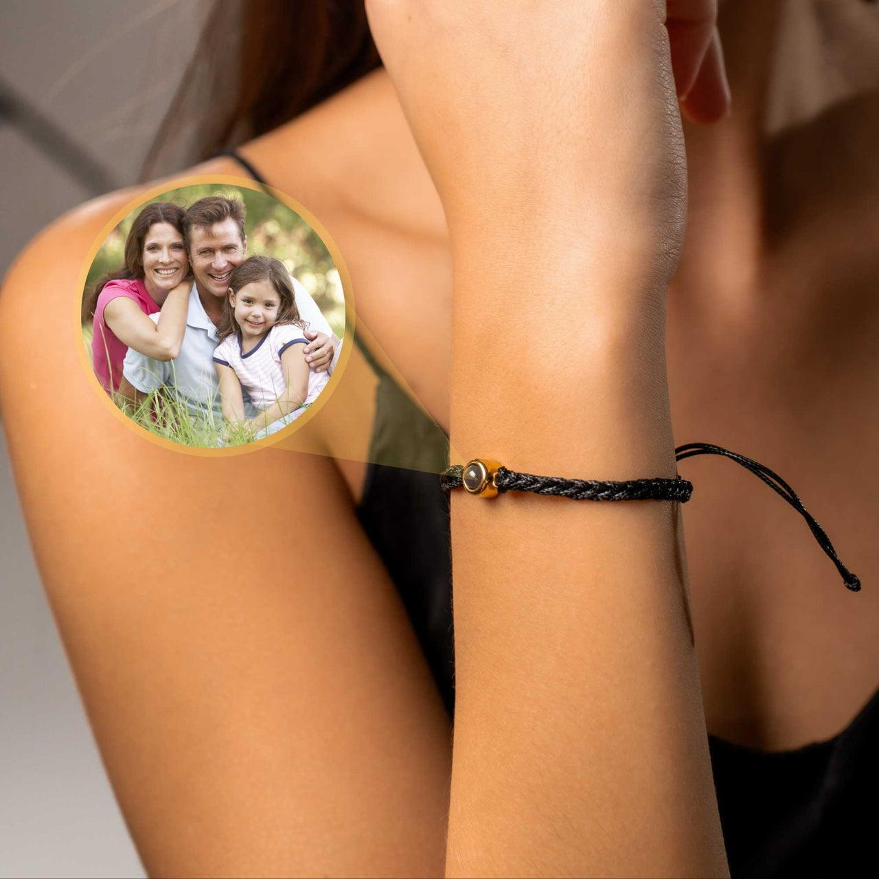 Black Photo Bracelet showcasing a personalized circular pendant with a family photo, designed by Brother & Sisters.