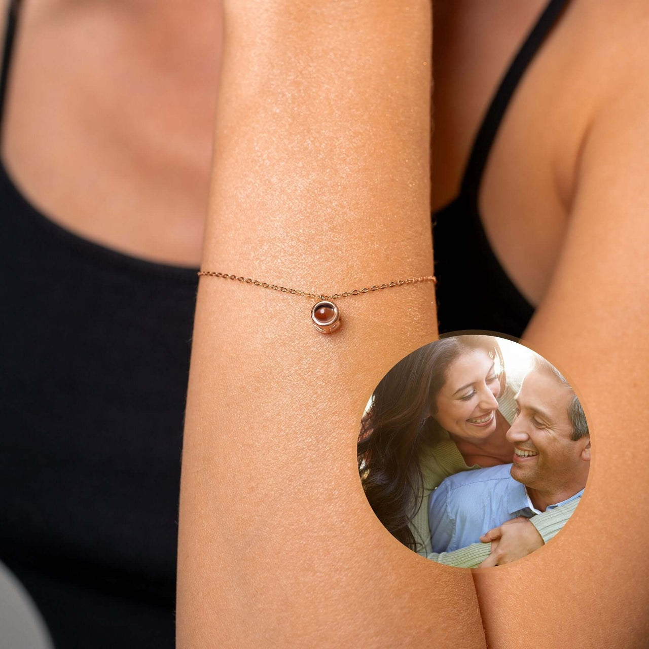 Circular Photo Bracelet by Brother & Sisters showcasing memories with a sleek charm on a woman's wrist.