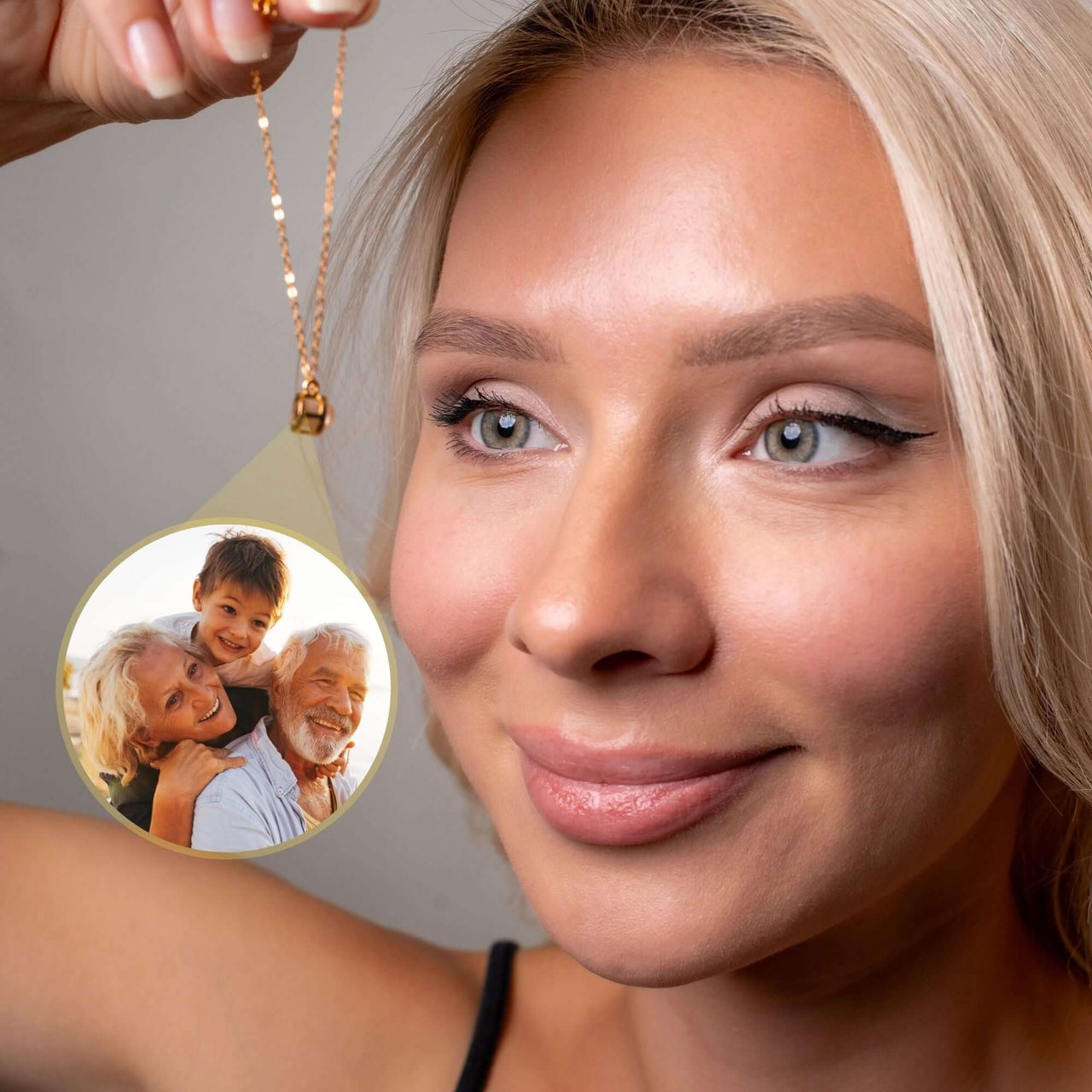 Woman holding a Circular Photo Bracelet featuring a family photo, designed by Brother & Sisters.