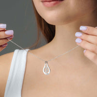 Thumbnail for Birth Flower Name Necklace worn by a woman, showcasing its unique design and elegance from Brother & Sisters.