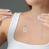 Thumbnail for Birth Flower Name Necklace showcased on a model, featuring personalized charm and elegant design by Brother & Sisters.