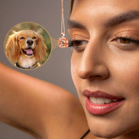 Thumbnail for A woman showcasing the Double Heart Photo Necklace by Brother & Sisters with a hidden pet photo projection.