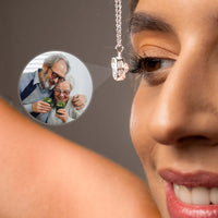 Thumbnail for Double Heart Photo Necklace showing a couple's photo projection, symbolizing love, by Brother & Sisters.