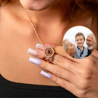 Thumbnail for Dream Catcher Photo Necklace showcasing a personalized photo charm by Brother & Sisters, worn on a woman's neck.