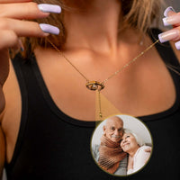 Thumbnail for Eye Photo Necklace featuring a customized photo projection in an eye-shaped pendant by Brother & Sisters.