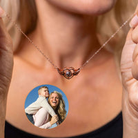 Thumbnail for Flying Heart Photo Necklace with wings, showcasing a custom photo, by Brother & Sisters.