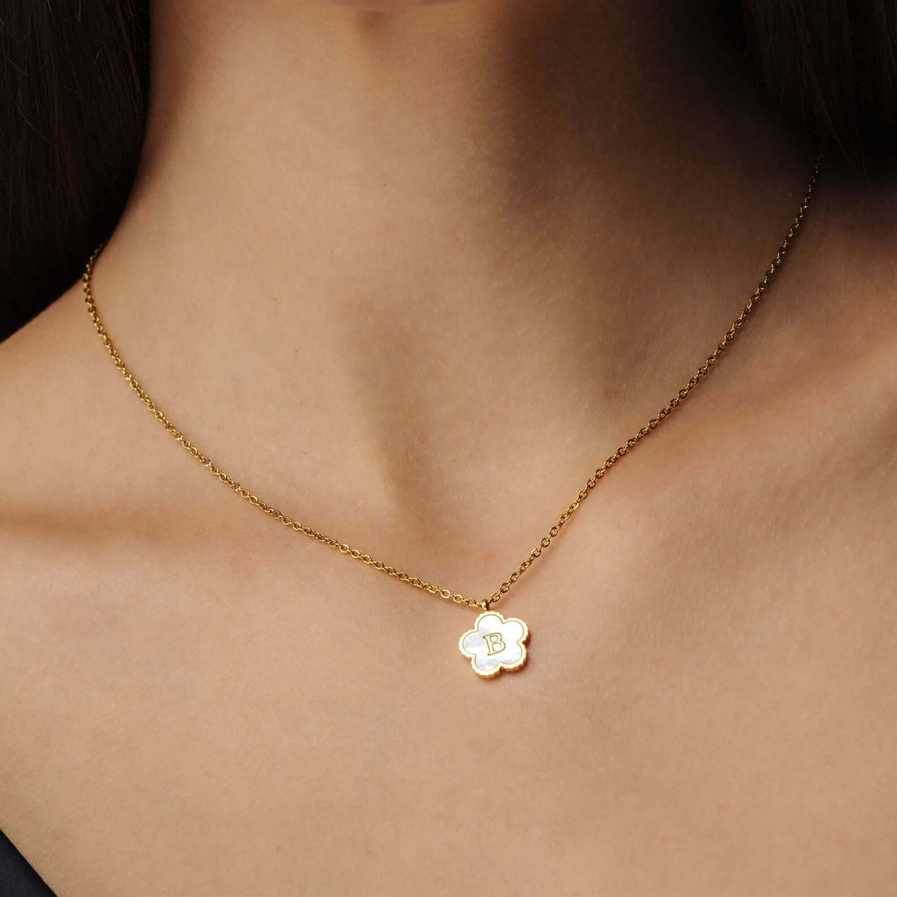Flower Initial Necklace - Delicate gold necklace with floral design by Brother & Sisters, featuring an initial charm.