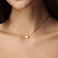 Thumbnail for Love Initial Necklace by Brother & Sisters, featuring a gold heart charm with a personalized initial.