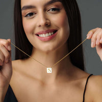 Thumbnail for Rectangle Initial Necklace worn by a woman, showcasing minimalist elegance by Brother & Sisters.
