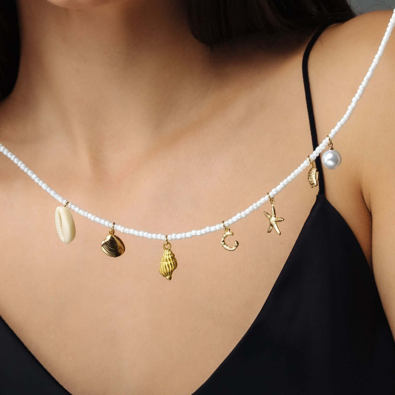 Summer Initial Necklace featuring ocean-inspired charms and gold accents by Brother & Sisters