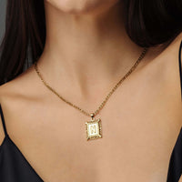 Thumbnail for Vintage Initial Necklace featuring a delicate gold letter charm by Brother & Sisters, perfect for elegant everyday wear.
