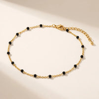 Thumbnail for Gold & Onyx Bead Anklet featuring glossy black enamel beads and delicate 18K gold-plated chain by Brother & Sisters.