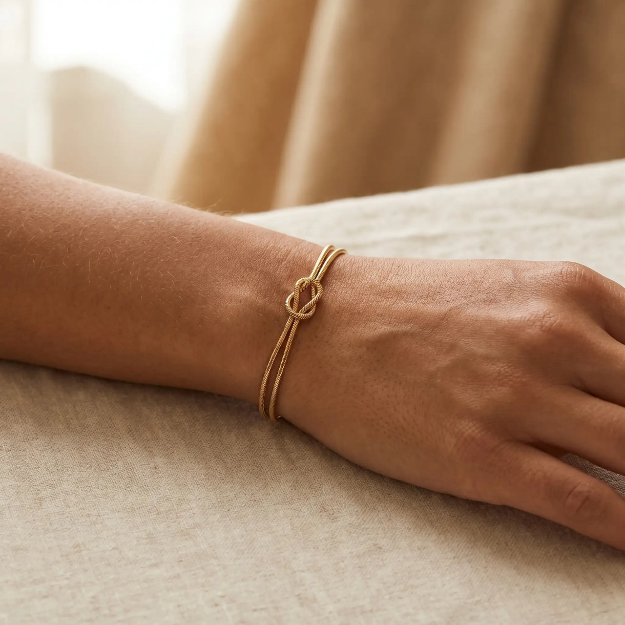 Knot Couple Bracelet gold worn intimate cozy interior