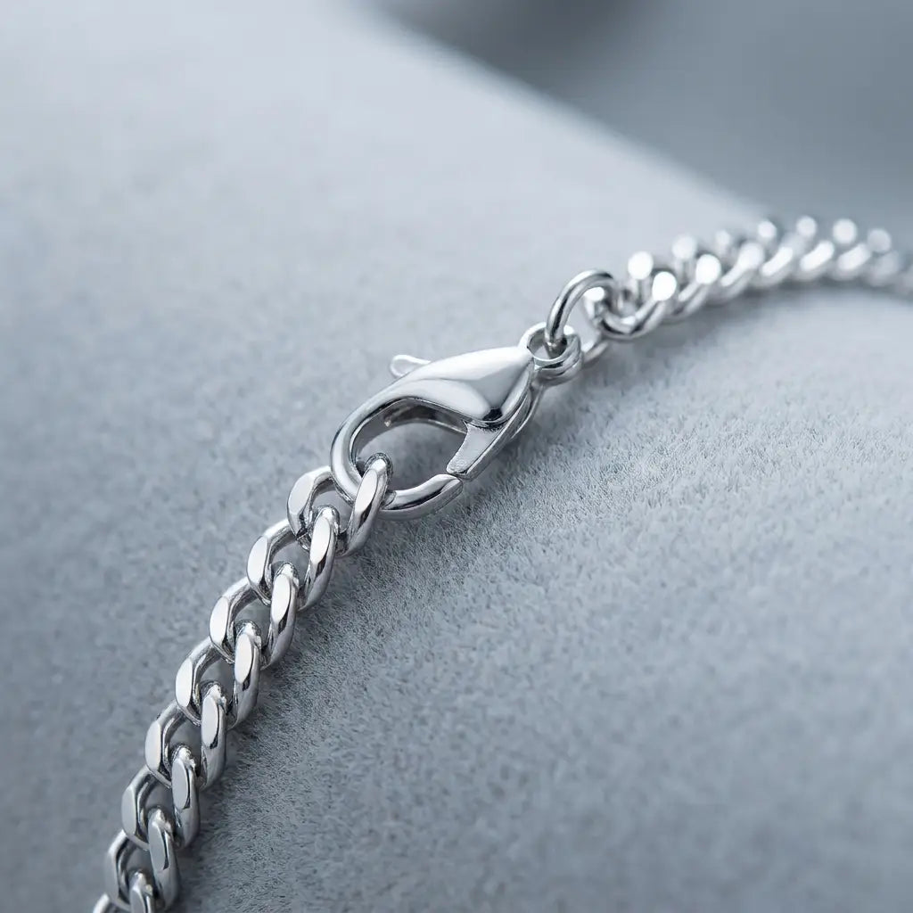 His silver cuban chain bracelet macro, slim refined daily wear