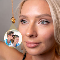 Thumbnail for Horn Photo Necklace featuring a couple's photo kept close, perfect for cherishing memories by Brother & Sisters.