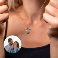 Thumbnail for Horn Photo Necklace worn by a woman, showcasing a personalized photo locket by Brother & Sisters.