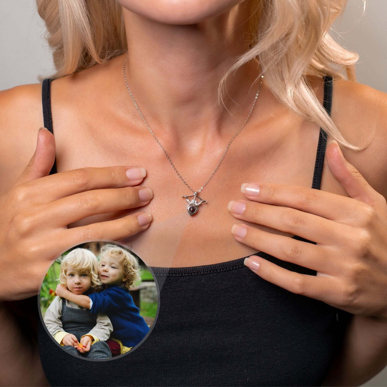 Horn Photo Necklace worn by a woman, showcasing a sentimental photo charm, by Brother & Sisters.