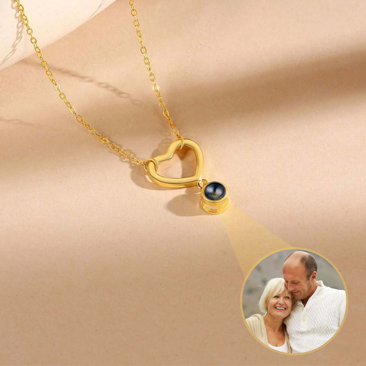 Infinite Love Photo Necklace by Brother & Sisters, heart-shaped pendant projecting a cherished photo.