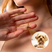 Thumbnail for Person displaying the Infinite Photo Necklace featuring a dog photo, designed by Brother & Sisters.