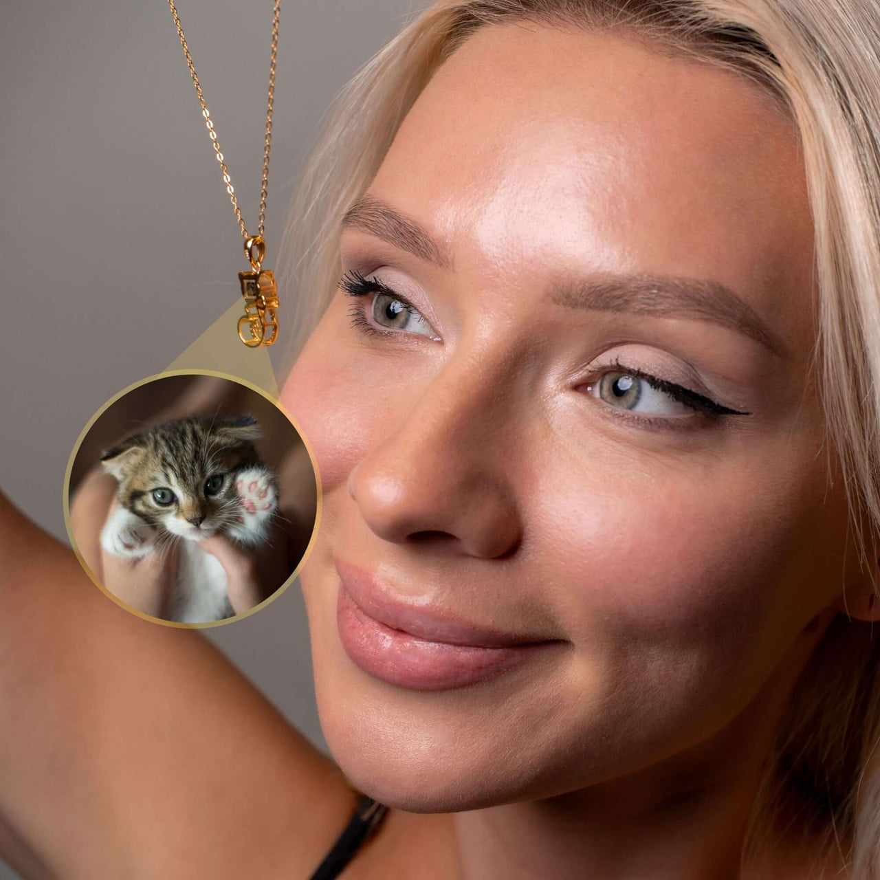 Kitten Photo Necklace featuring a woman wearing a personalized necklace with a kitten photo by Brother & Sisters.
