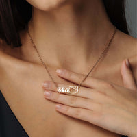 Thumbnail for Kitty Name Necklace featuring customizable name 'Mia' by Brother & Sisters, stylish and personal accessory.