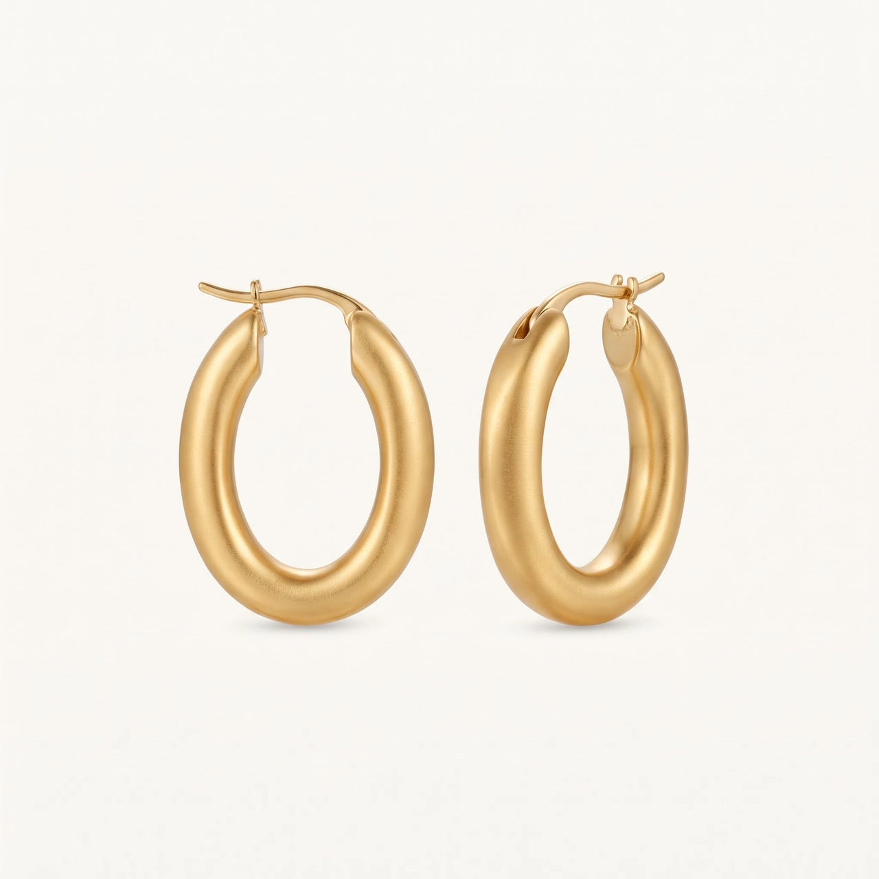 Oorringen — productfoto op witte achtergrond, goud | SKU: lesmates