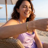 Thumbnail for Loyal, Brave, And, True bracelet in gold worn during a relaxed moment | SKU: lbat-g