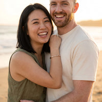 Thumbnail for Couple moment, she wears the Loyal, Brave, And, True bracelet in rose gold | SKU: lbat-rg