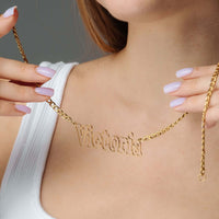 Thumbnail for Luxury Name Necklace showcasing personalized name 'Victoria' by Brother & Sisters in elegant gold design.