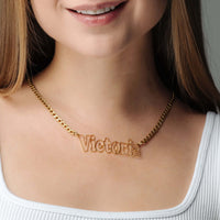 Thumbnail for Luxury Name Necklace by Brother & Sisters worn by a model featuring the name Victoria in elegant gold design.
