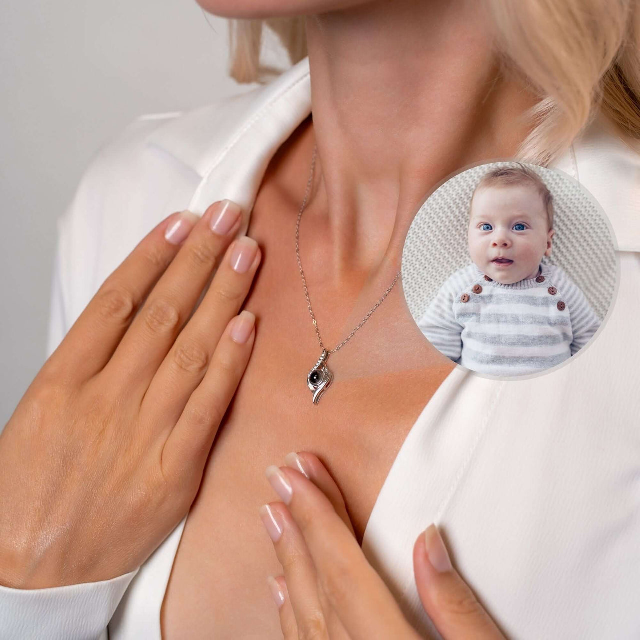 Luxury Photo Necklace worn by a woman, showcasing a hidden photo of a baby in the elegant pendant by Brother & Sisters.