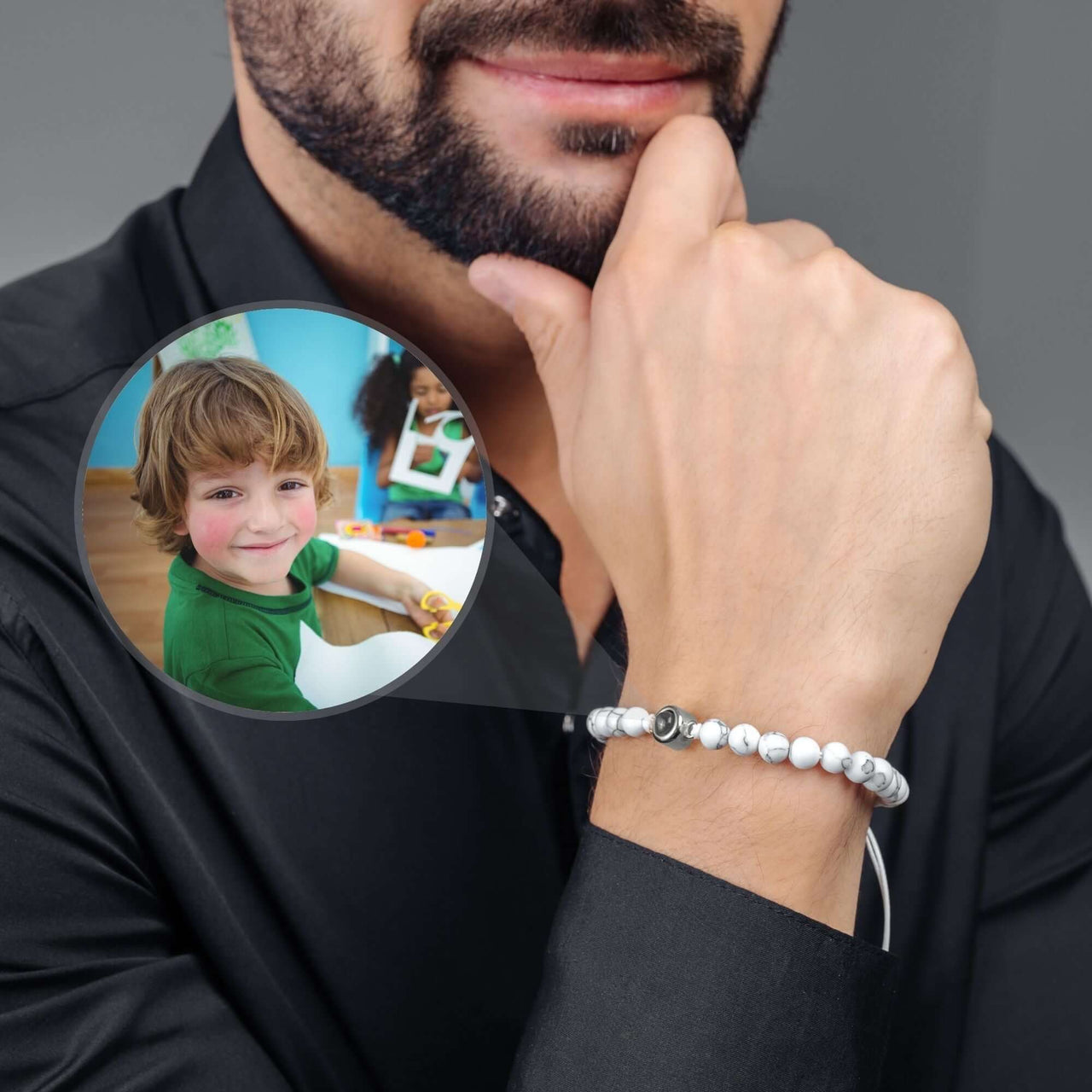 Minimalist Photo Bracelet worn by a man, featuring a personalized photo charm, by Brother & Sisters.