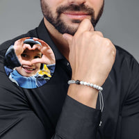 Thumbnail for Man wearing a Minimalist Photo Bracelet by Brother & Sisters, showcasing a heartfelt photo charm.
