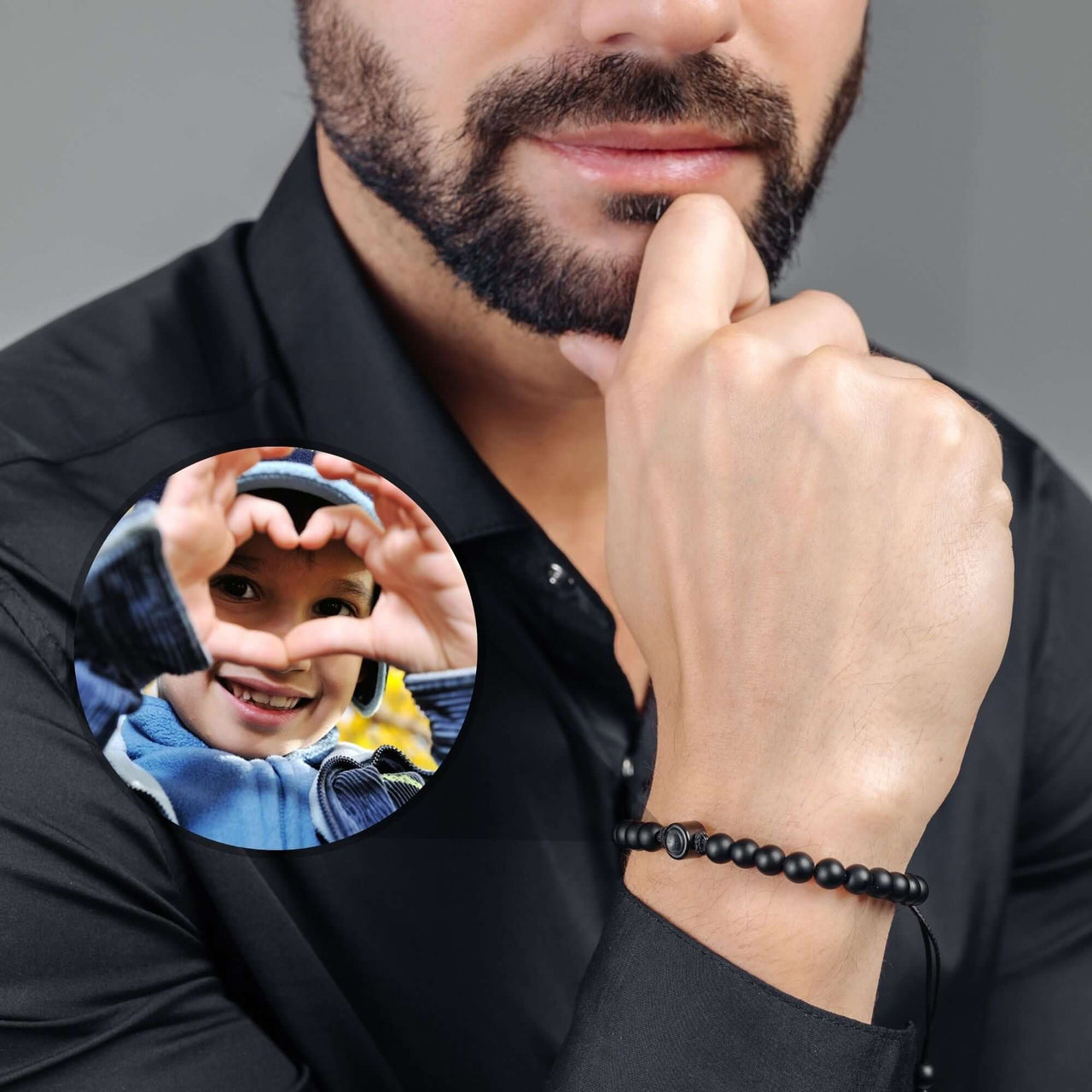 Minimalist Photo Bracelet featuring a man wearing lava stone beads and a photo of a child making a heart gesture.
