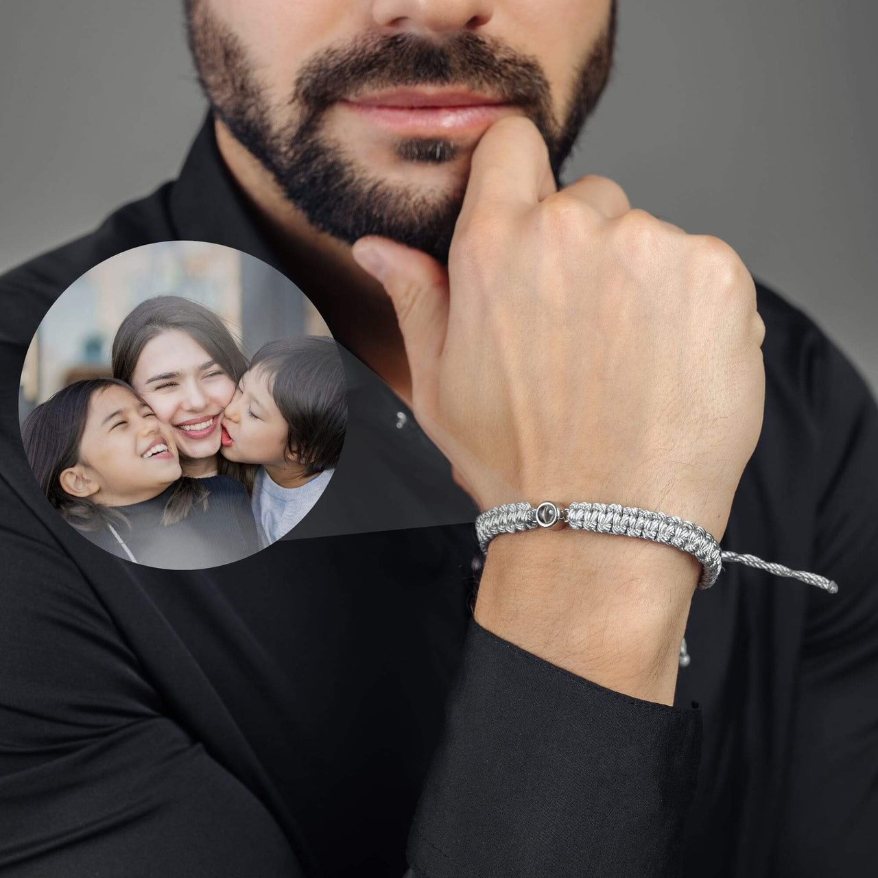 Man Grey Photo Bracelet worn by a man, featuring a personalized photo pendant, by Brother & Sisters.