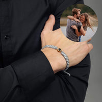 Thumbnail for Man Grey Photo Bracelet worn on wrist, with a photo of a couple embracing, by Brother & Sisters.