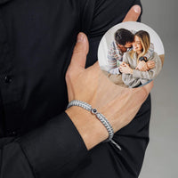 Thumbnail for Man Grey Photo Bracelet worn by a man, featuring a circle pendant with personalized photo, by Brother & Sisters.