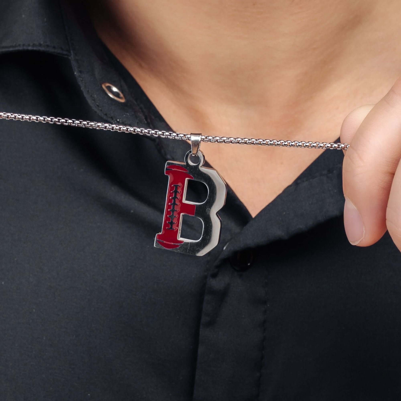 Close-up of Silver Rugby Initial Necklace by Brother & Sisters featuring a bold 'B' pendant, highlighting personalization and style.