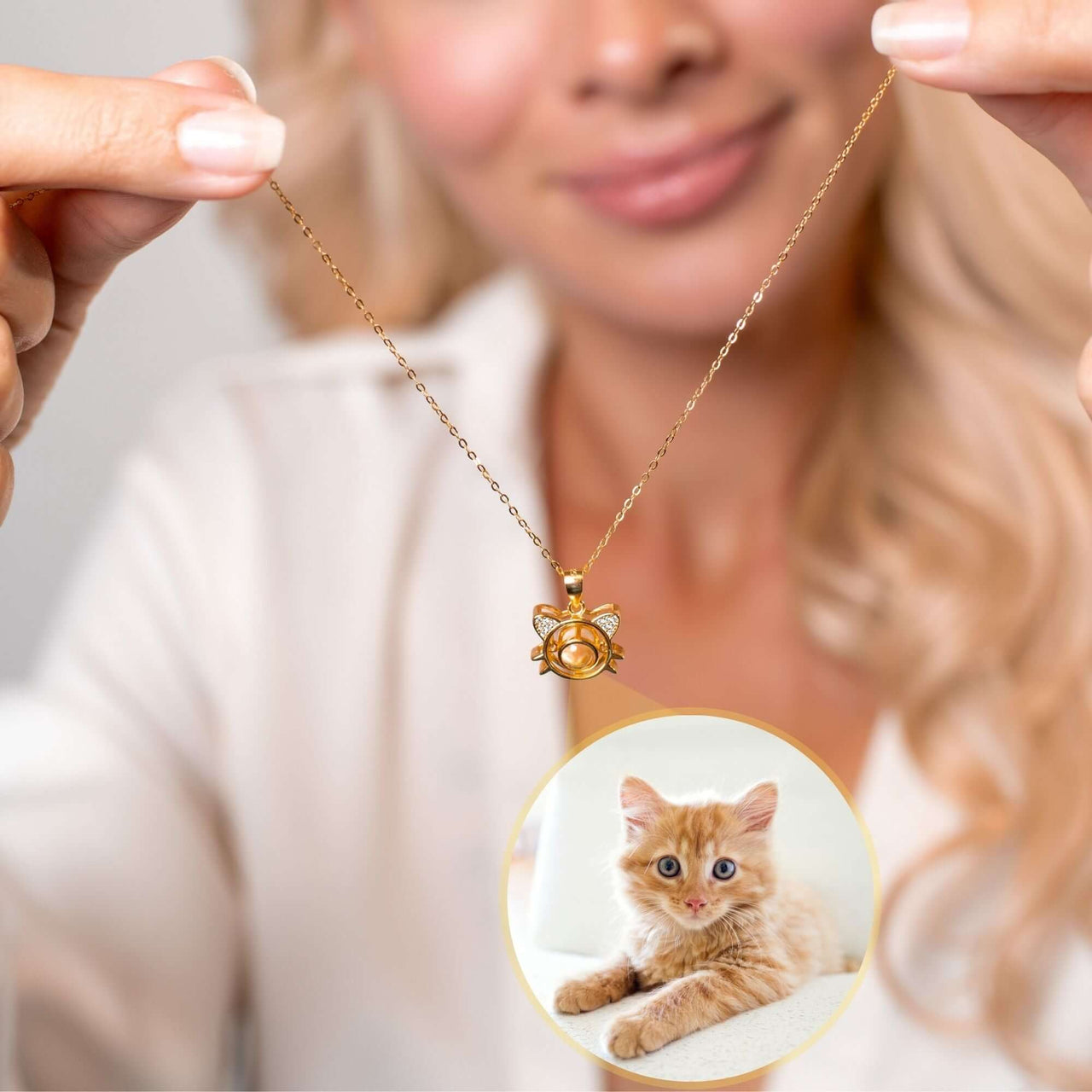 Meow Photo Necklace held by a woman showcasing personalized cat photo projection by Brother & Sisters.