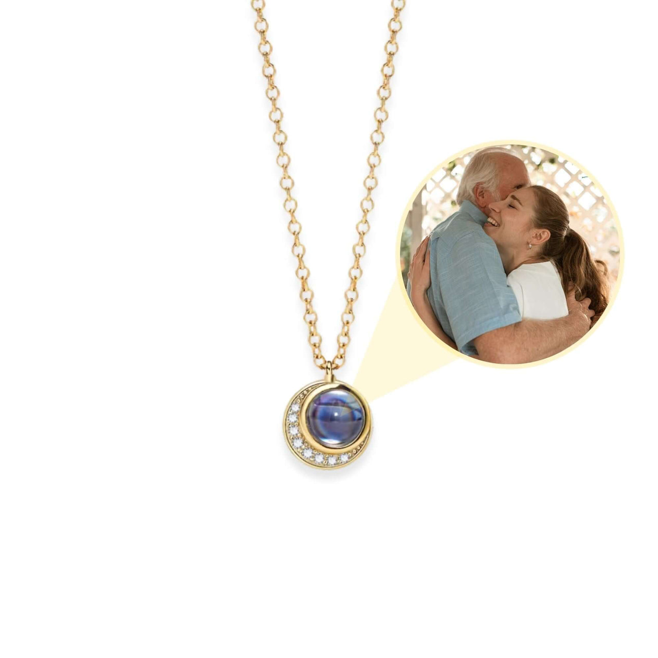Moonlight Photo Necklace by Brother & Sisters with a moon-shaped pendant holding a cherished photo.